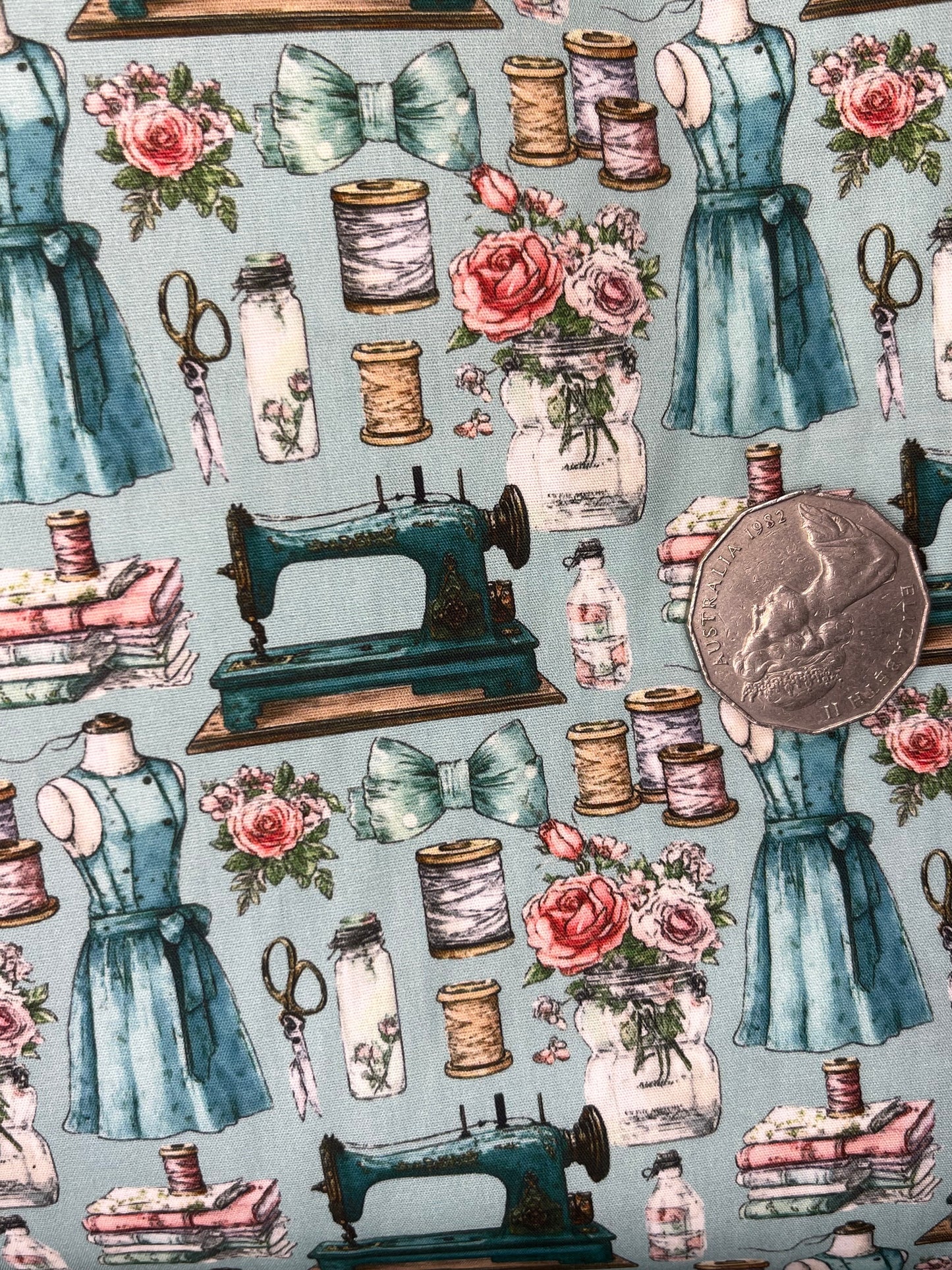 Sewing Machine, Dress, Scissors on Lite Blue
