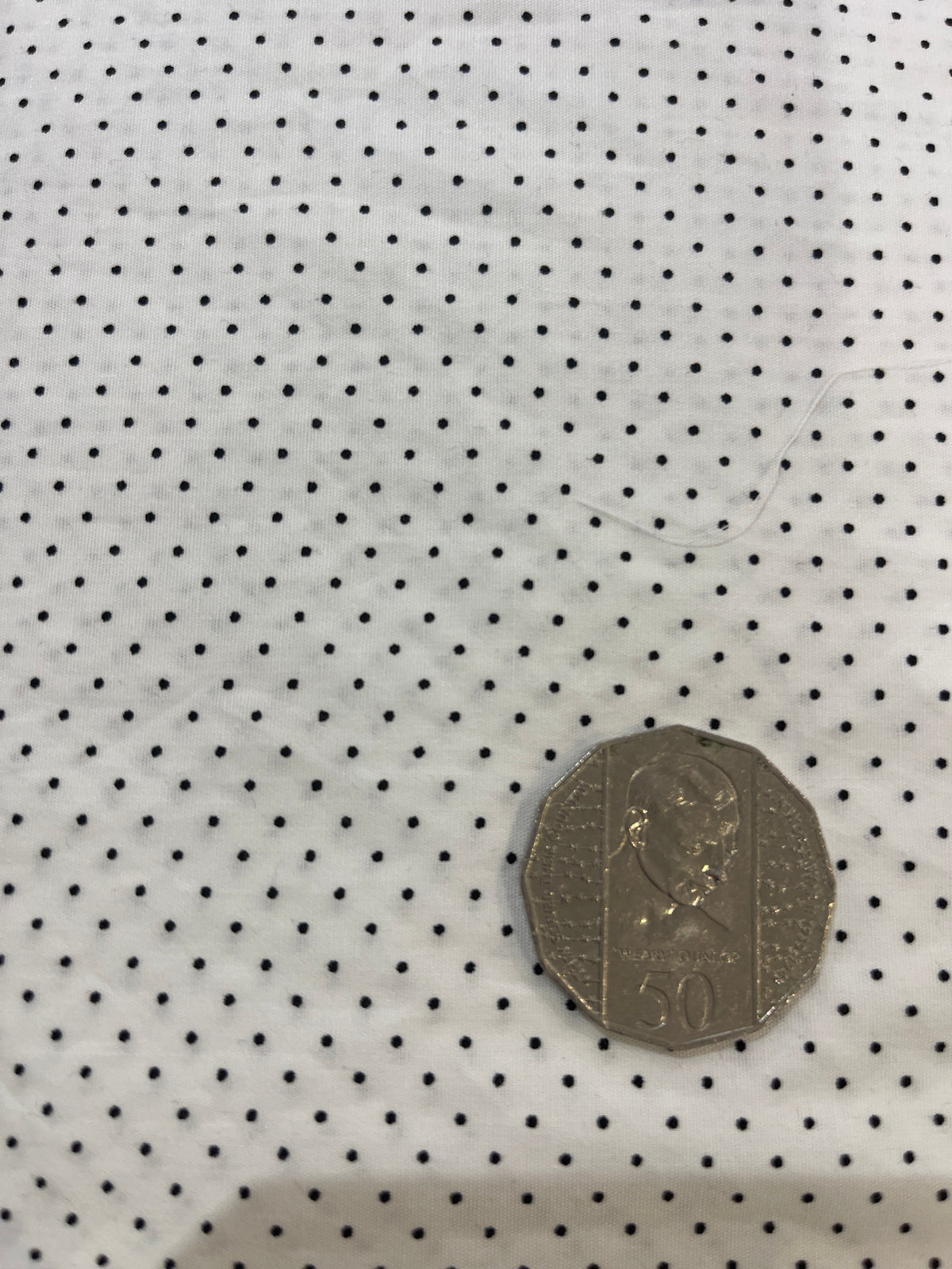 White with Small Black Dots