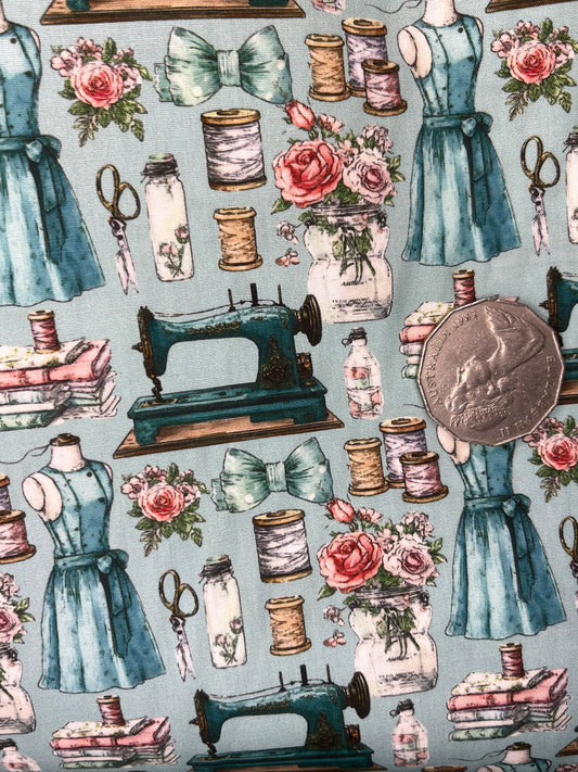 Sewing Machine, Dress, Scissors on Lite Blue