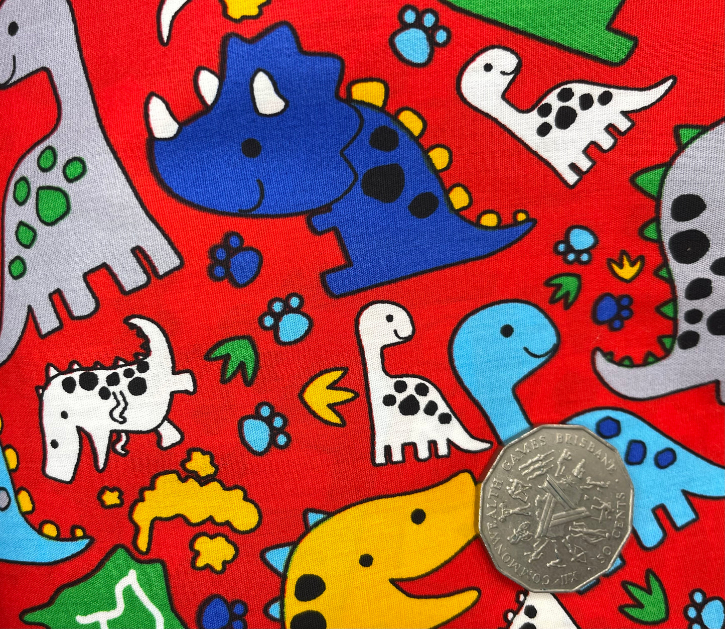 Bright Dinosaurs on Red