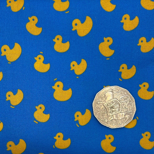 Yellow Ducks with Blue Background